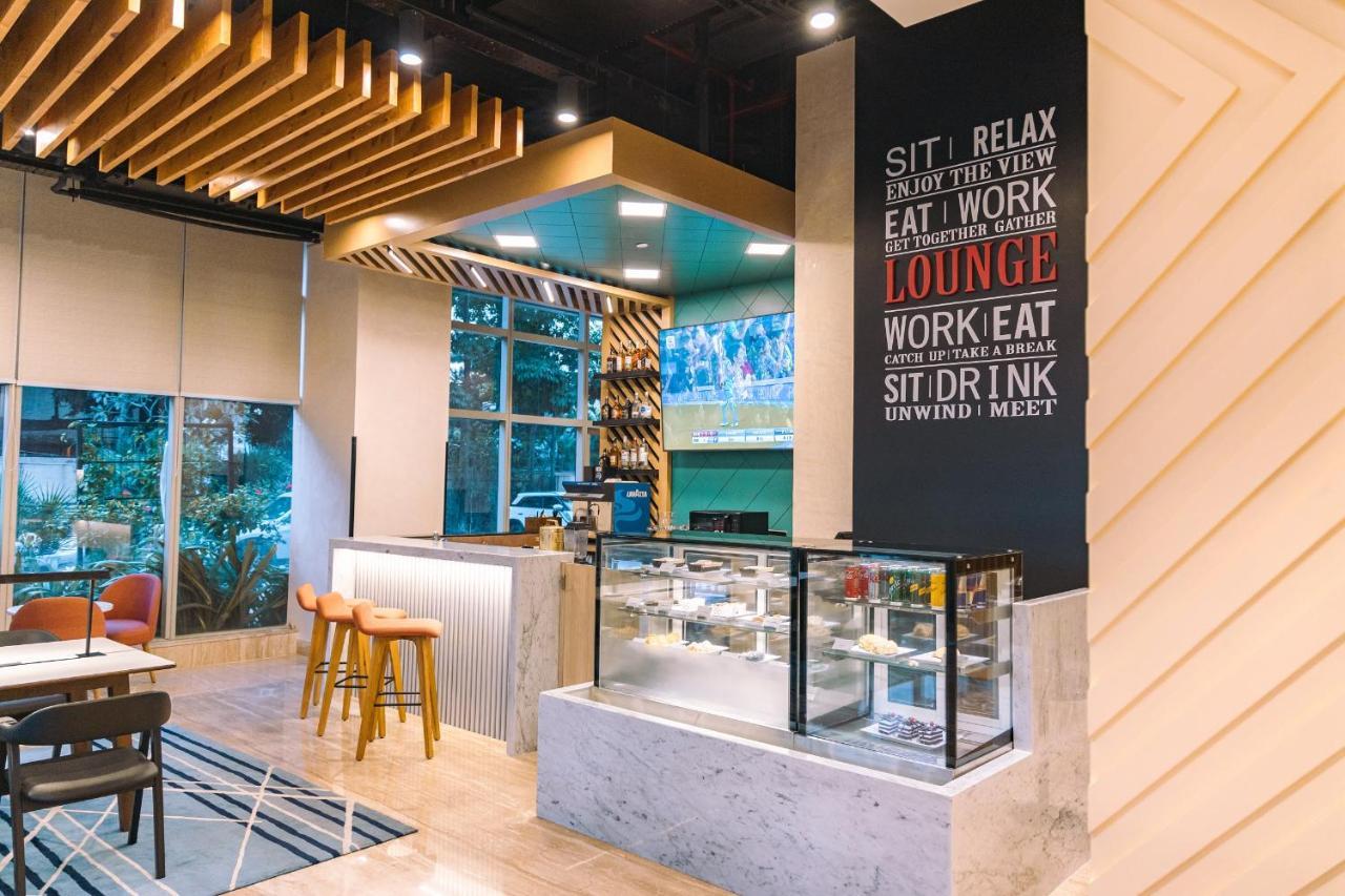 Holiday Inn Bengaluru Racecourse By Ihg Exteriér fotografie Lounge at KLIA